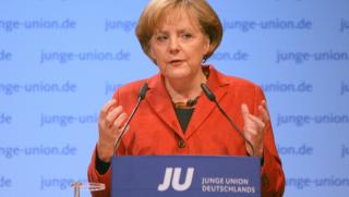 Меркел, избори, печели, абсолютно мнозинство