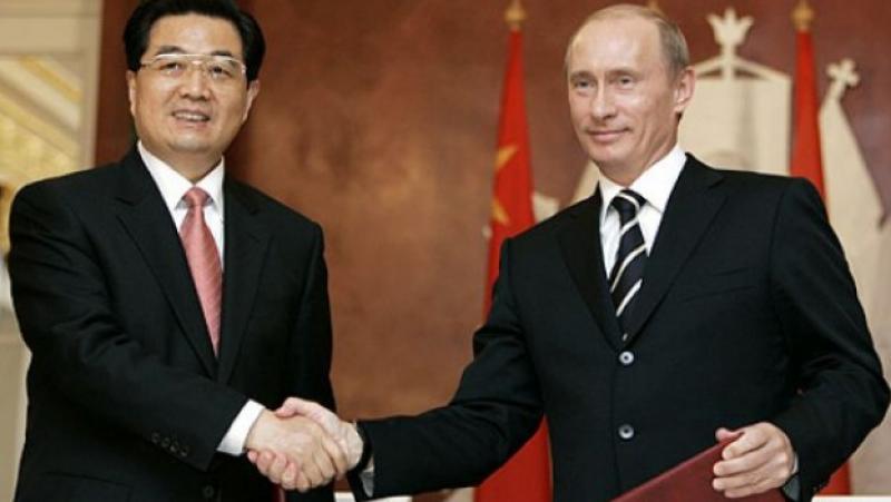 China gives Putin a diplomatic arm
 –