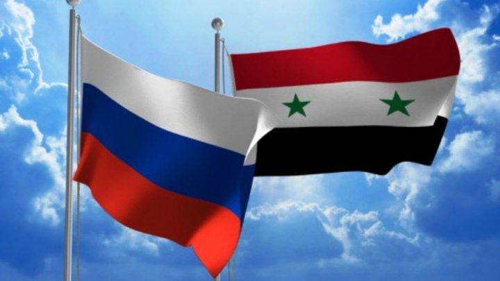 Кюрди сложиха флаговете на Сирия и Русия до границата с Турция