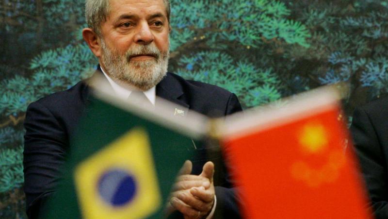 The Brazilian president will visit China at the head of a large delegation
 –