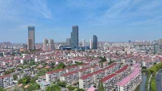 2025 г., Китай, инвестирал, жилищни сгради, градовете